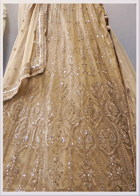 Drak Cream Festive Wear Sequins Work Net Lehenga Choli