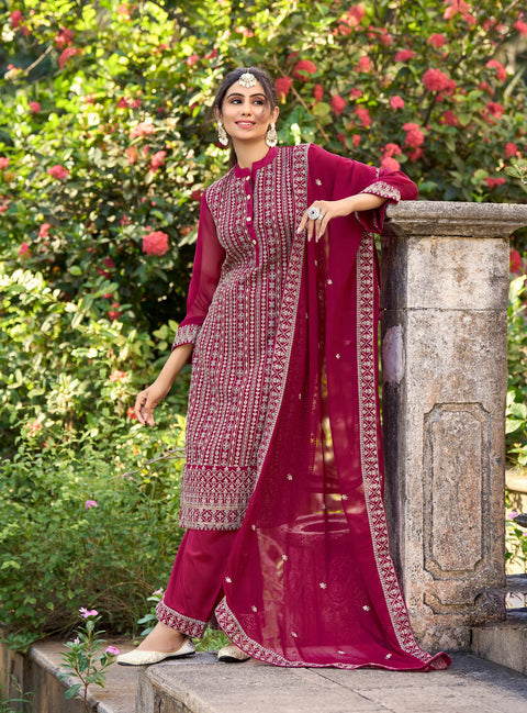 Magenta Colored Partywear Embroidered Silk Straight Suit