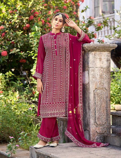 Magenta Colored Partywear Embroidered Silk Straight Suit