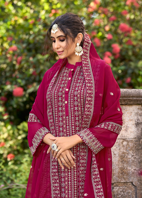 Magenta Colored Partywear Embroidered Silk Straight Suit