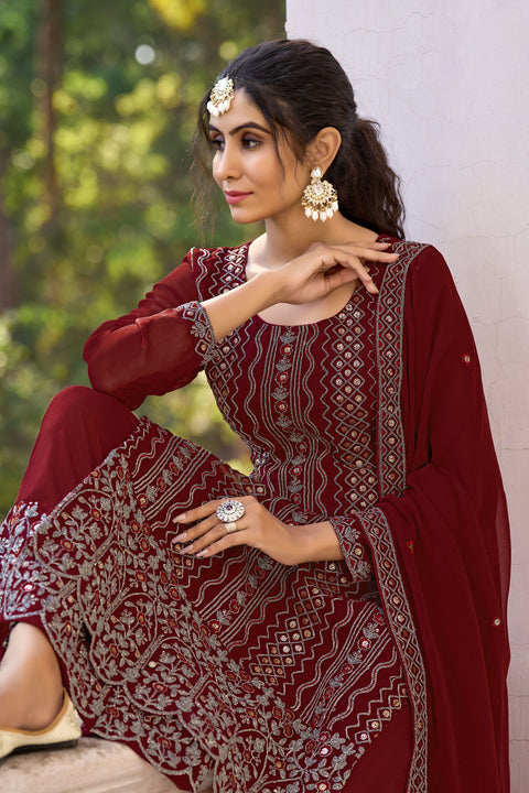 Maroon Colored Partywear Embroidered Silk Straight Suit