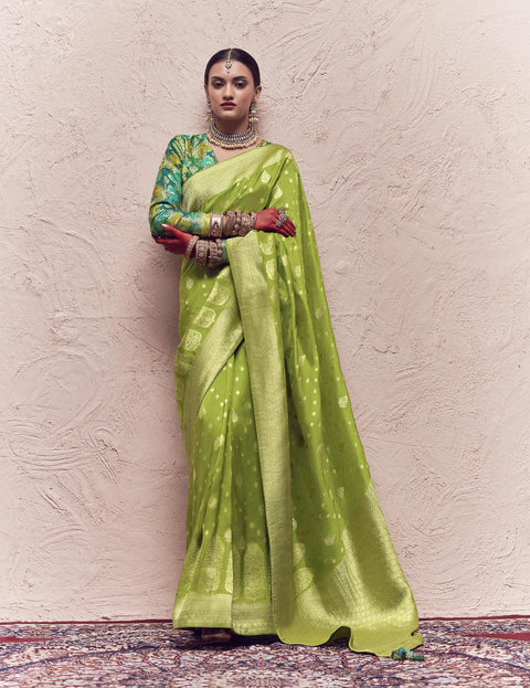 Green Woven Crepe Dola Silk Saree With Tassels