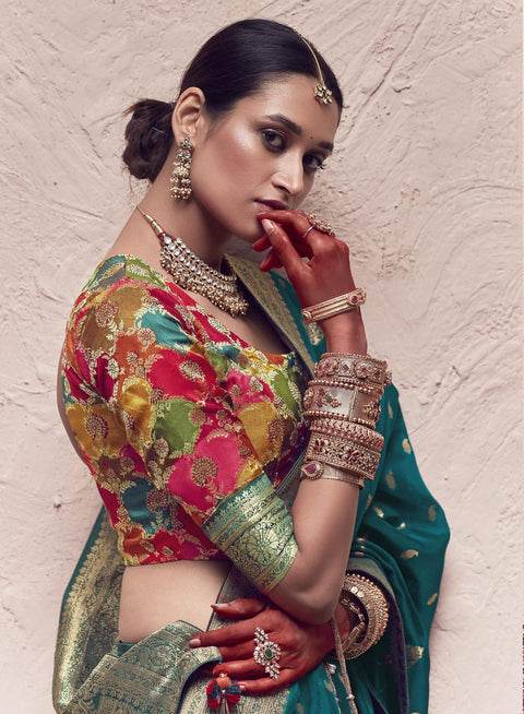 Teal Blue Woven Crepe Dola Silk Saree With Tassels