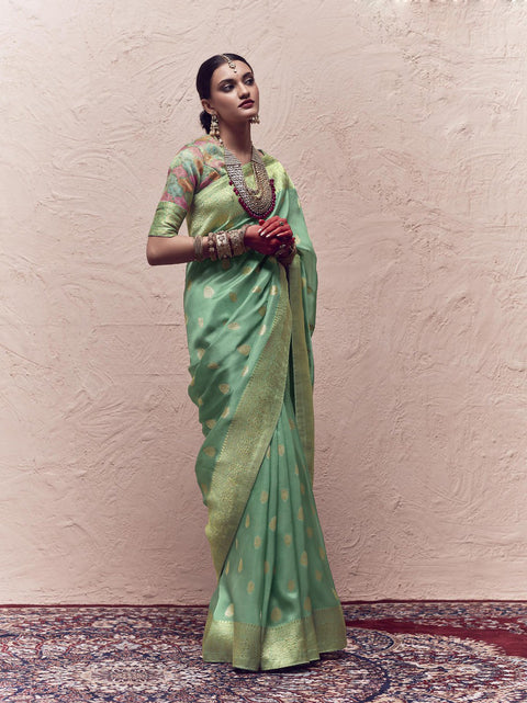 Green Woven Crepe Dola Silk Saree With Tassels