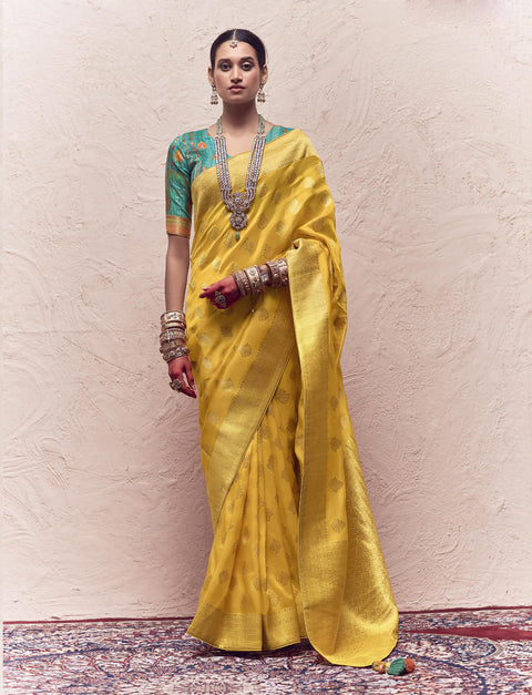 Yellow Woven Crepe Dola Silk Saree With Tassels