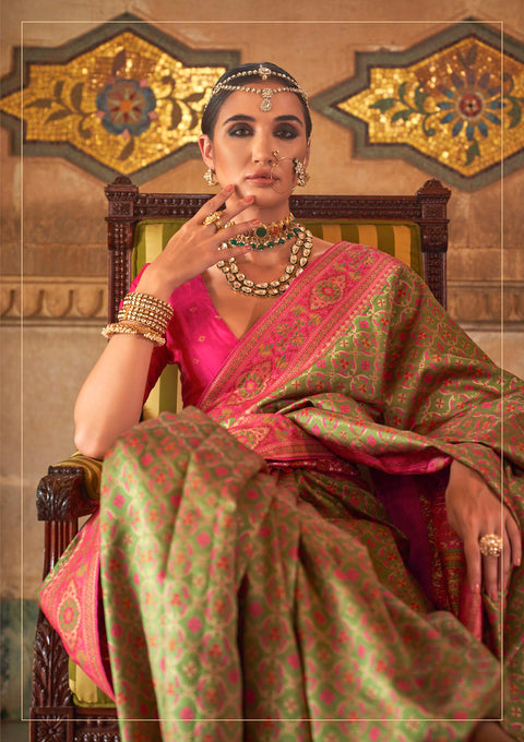 Green Woven Banarasi Silk Saree With Tassels