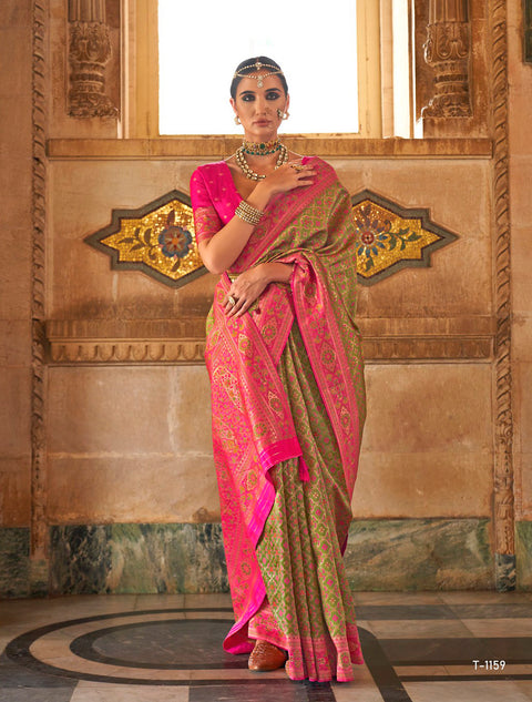 Green Woven Banarasi Silk Saree With Tassels