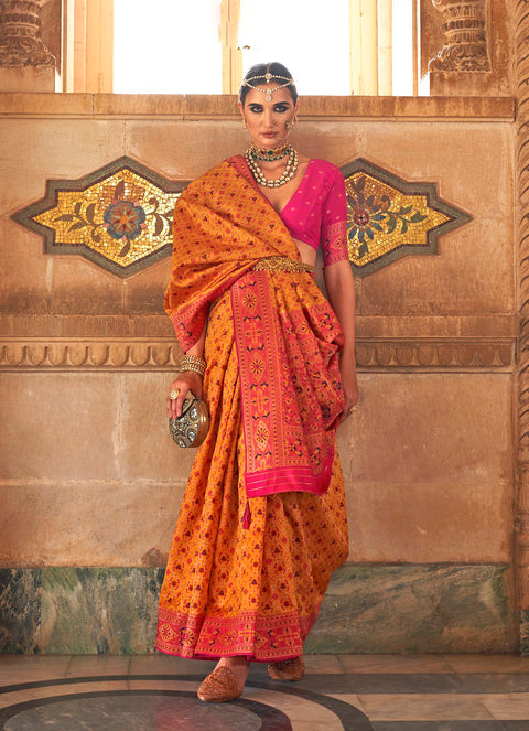 Orange Woven Banarasi Silk Saree With Tassels