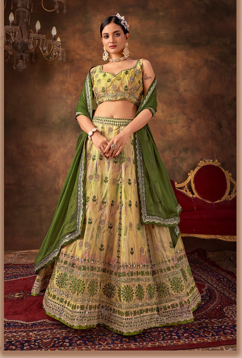 Cream Embroidered Net Wedding Wear Lehenga Choli
