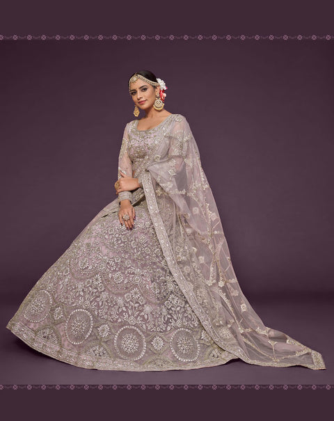 Dusky Orchid Festive Lehenga Choli Set In Soft Net With Zari And Thread Work