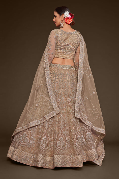 Royal Beige Festive Lehenga Choli Set In Soft Net With Zari And Thread Work