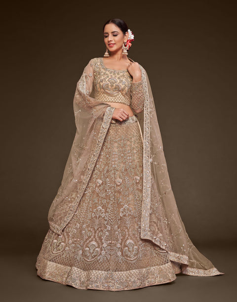 Royal Beige Festive Lehenga Choli Set In Soft Net With Zari And Thread Work