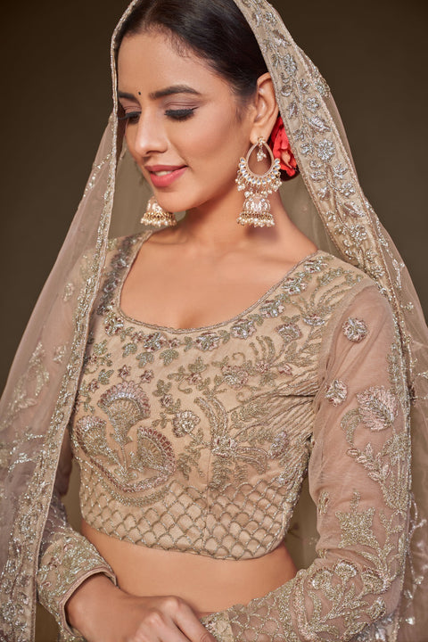 Royal Beige Festive Lehenga Choli Set In Soft Net With Zari And Thread Work