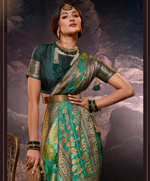 Green Party Wear Rangkart Silk Saree With Tassels
