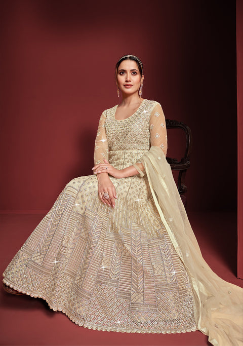 Imposing Baige Colored Partywear Embroidered Netted Anarkali Suit