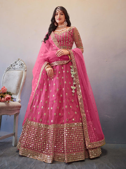 Exceptional Drak Pink Colored Partywear Embroidered Net Lehenga Choli