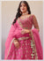 Exceptional Drak Pink Colored Partywear Embroidered Net Lehenga Choli
