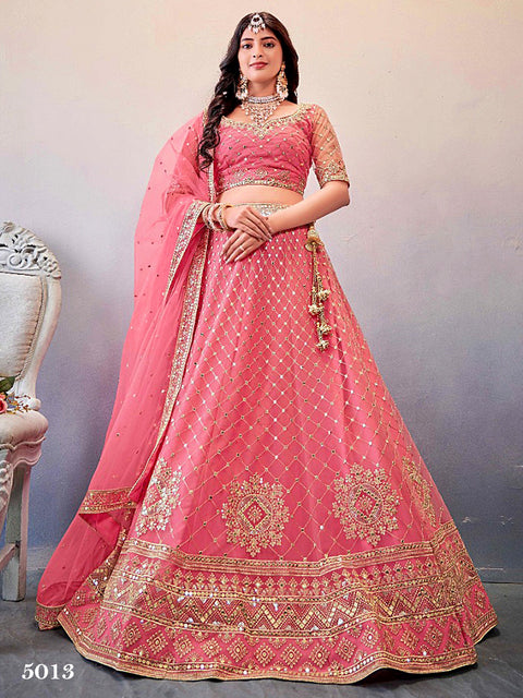 Stunning Pink Colored Partywear Embroidered Netted Lehenga Choli