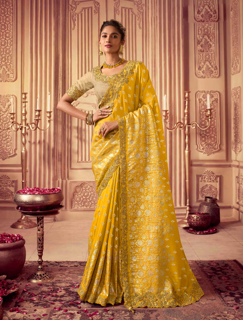Yellow Festive Wear Silk Saree With Tassels