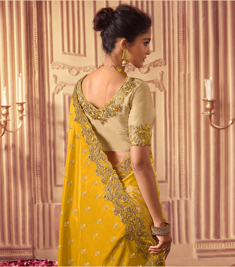 Yellow Festive Wear Silk Saree With Tassels