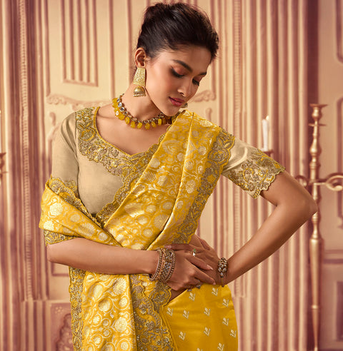 Yellow Festive Wear Silk Saree With Tassels