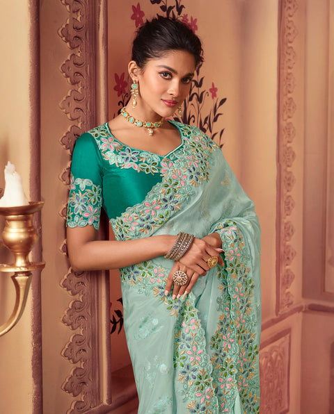 Teal Blue Festive Wear Silk Saree With Tassels
