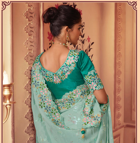Teal Blue Festive Wear Silk Saree With Tassels