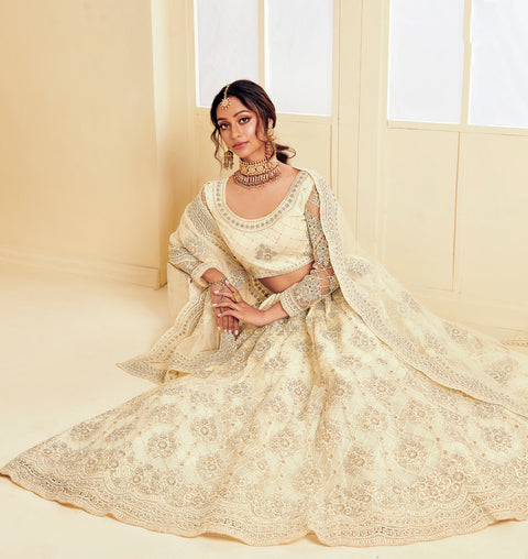 Off White Heavy Embroidered Net Lehenga Choli Set