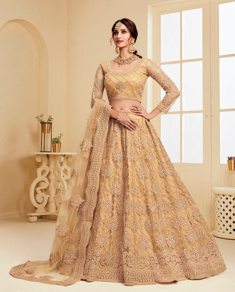 Golden Heavy Embroidered Wedding Net Lehenga Choli